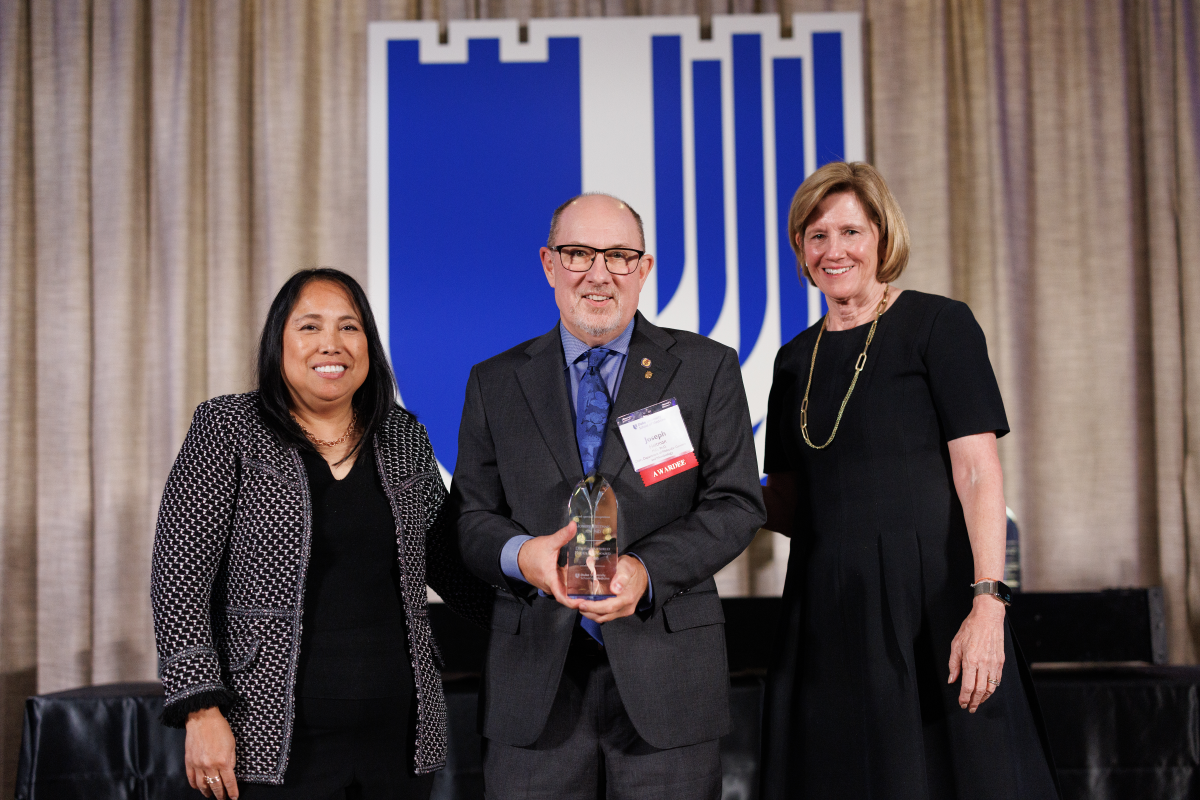 Joseph Heitman honored at Duke Medical Alumni Association awards celebration. Pictured with Dean Klotman.