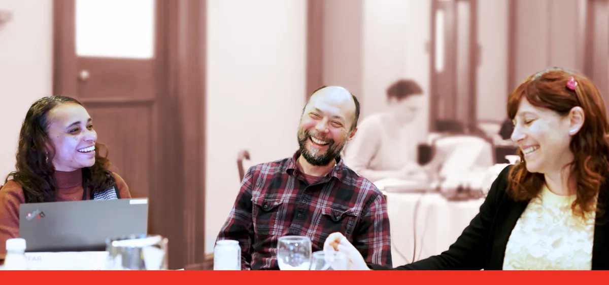 3 scientists talking to each other